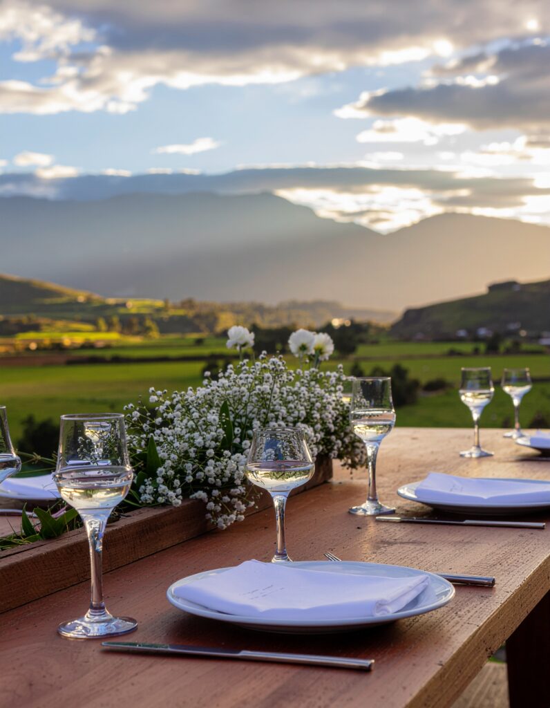 firefly elegant outdoor wedding table in the sacred valley of cusco, with glasses of premium 256402 firefly elegant outdoor wedding table in the sacred valley of cusco, with glasses of premium 256402